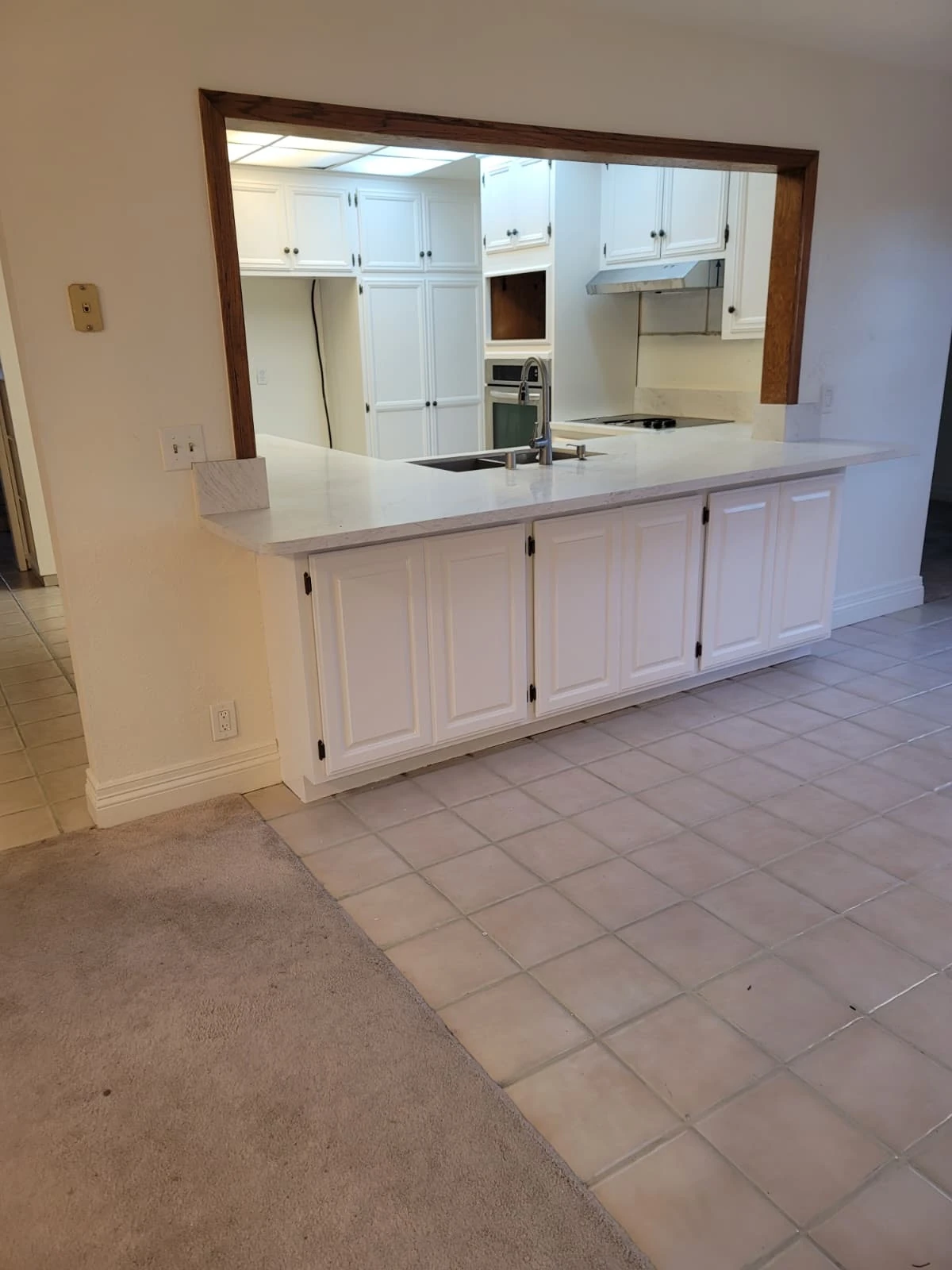 Kitchen cabinets after refinishing - View 2
